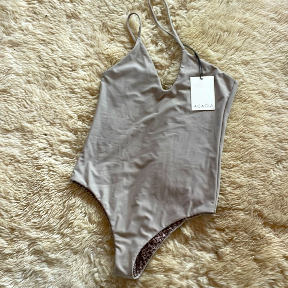 Brand new Acacia one piece. Tags on small in pebble.